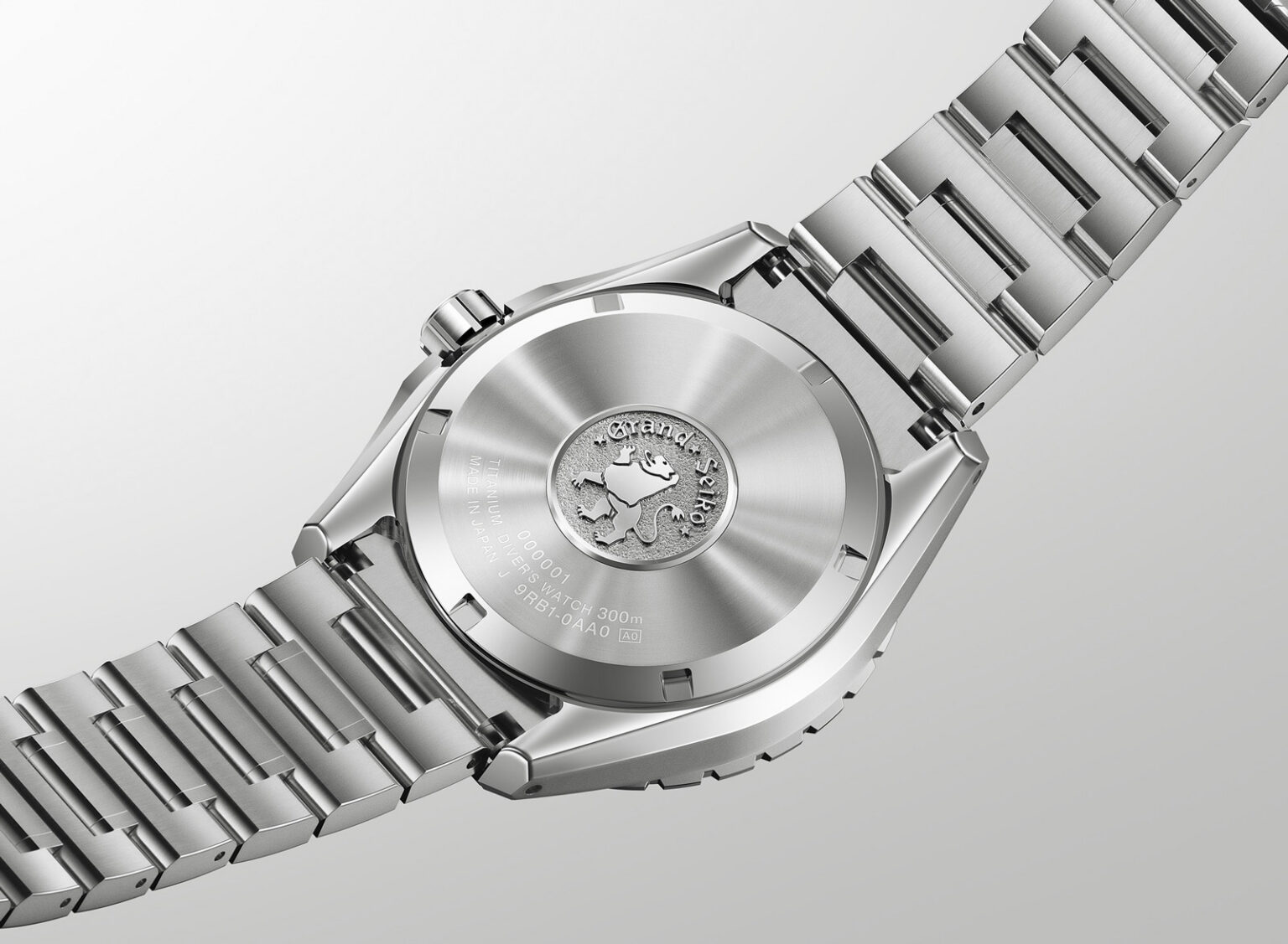 Grand Seiko Evolution 9 Collection Spring Drive U.F.A. Ushio 300 Diver “Ushio Blue” SLGB023 and “Ushio Green” SLGB025 caseback